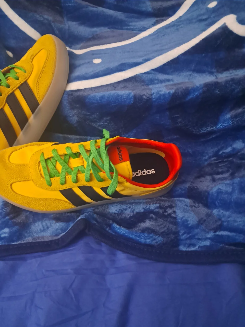Adidas Yellow Sneakers with Black Stripes and Green Laces